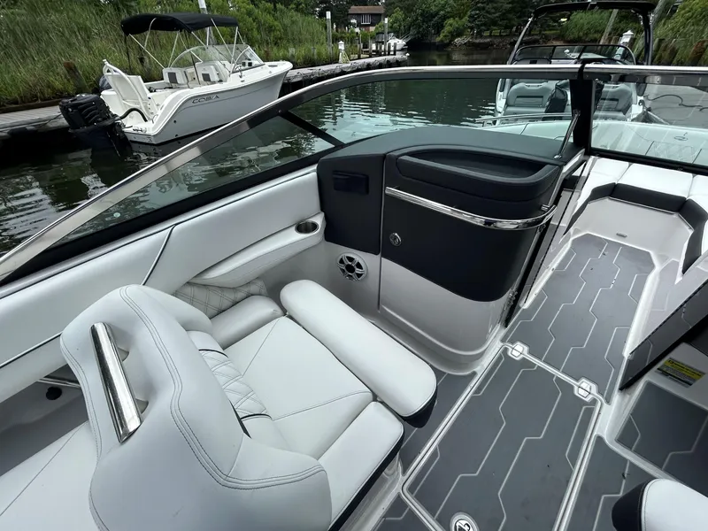 Slide: The Image of Luxurious interior of 2026 Regal LX4 boat with sleek seating and modern design. - 13