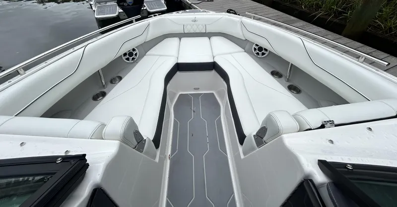 Slide: The Image of 2026 Regal LX4 boat interior with white seating and modern design. - 15