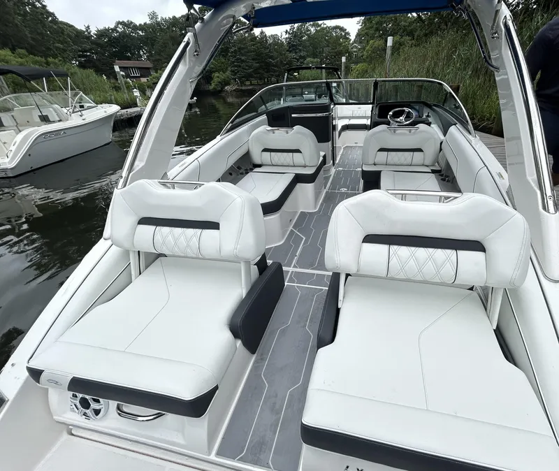 Slide: The Image of Luxurious 2026 Regal LX4 boat interior with white seating and sleek design. - 4
