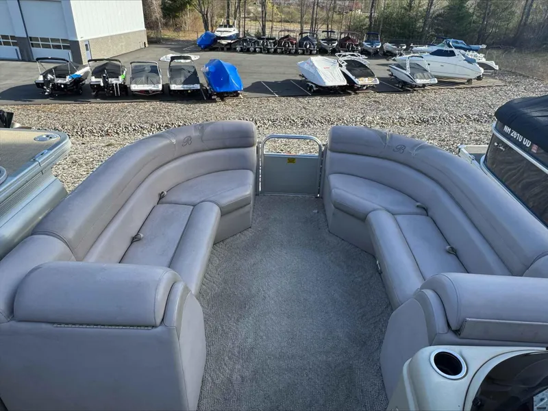 Slide: The Image of 2013 Berkshire 230CL STS pontoon boat with spacious seating and carpeted deck. - 10