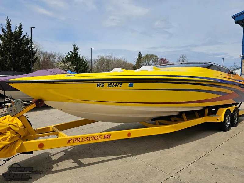 Slide: The Image of 2006 Advantage 28 Victory Bowrider in bright yellow on a matching trailer. - 14
