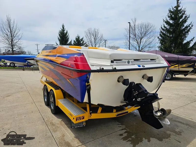 Slide: The Image of 2006 Advantage 28 Victory Bowrider boat with vibrant colors on a trailer. - 26