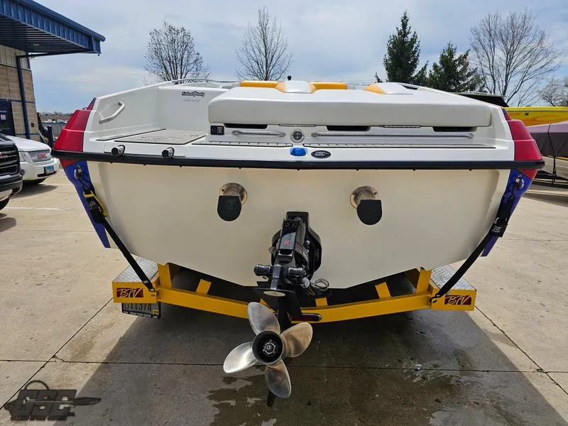 Slide: The Image of 2006 Advantage 28 Victory Bowrider on trailer, rear view with propeller visible. - 28