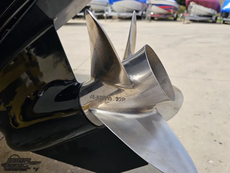 Slide: The Image of Close-up of a 2006 Advantage 28 Victory Bowrider boat propeller on a concrete surface. - 30