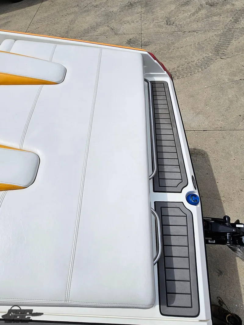 Slide: The Image of 2006 Advantage 28 Victory Bowrider boat with white and yellow seating, viewed from above. - 41