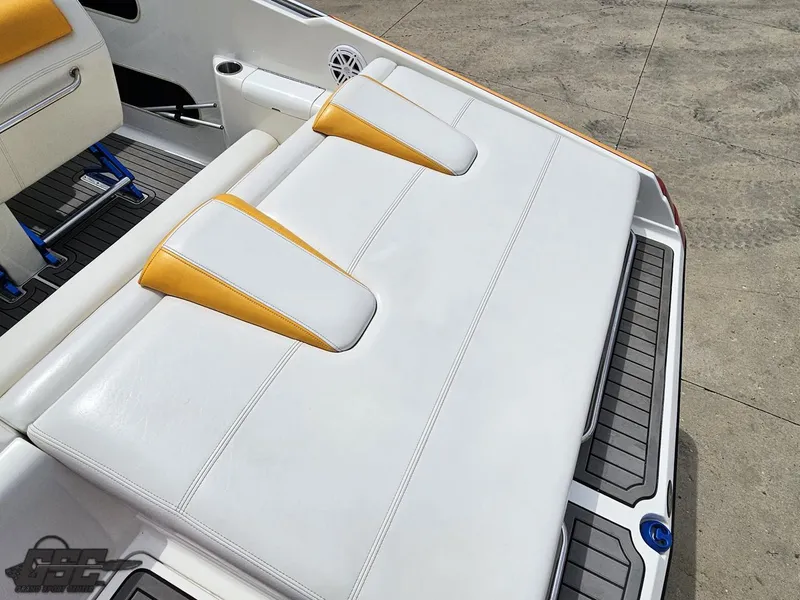 Slide: The Image of 2006 Advantage 28 Victory Bowrider with white and yellow seating, showcasing sleek design and comfort. - 42