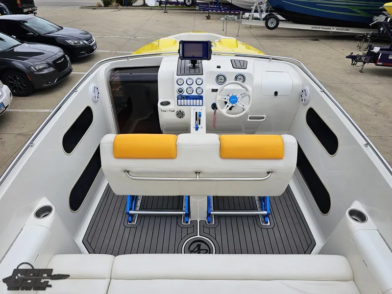 Slide: The Image of 2006 Advantage 28 Victory Bowrider cockpit with yellow accents and modern controls. - 47