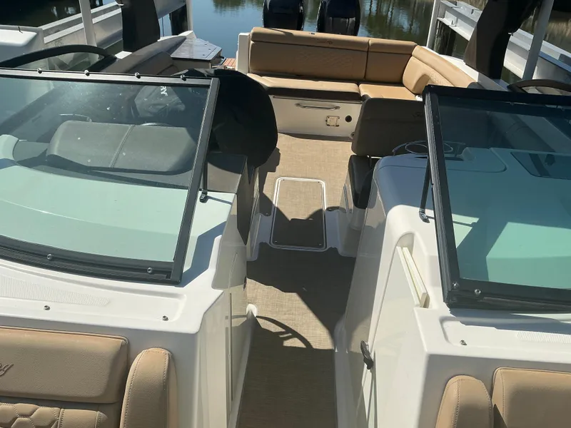 Slide: The Image of 2018 Sea Ray SDX 290 Outboard boat interior with seating and windshield. - 17