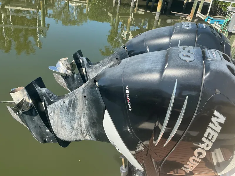 Slide: The Image of Twin Mercury Verado outboard engines on a 2018 Sea Ray SDX 290 boat. - 24