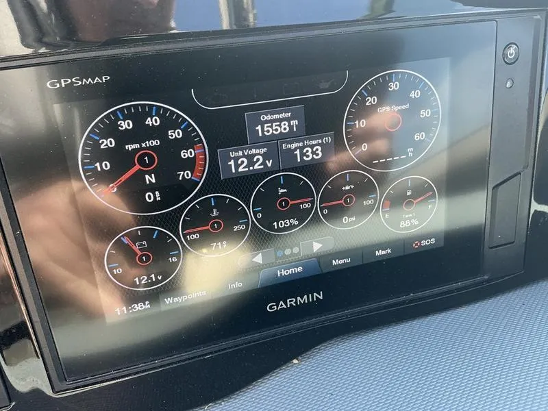 Slide: The Image of Garmin GPSMAP display in 2021 Cobalt R7 showing engine metrics and odometer. - 12