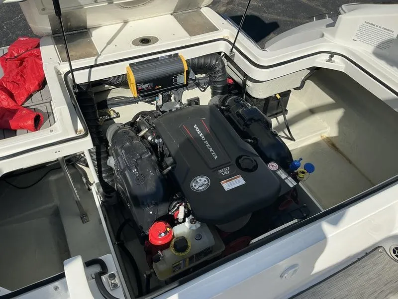 Slide: The Image of Engine compartment of a 2021 Cobalt R7 boat, showcasing a powerful motor setup. - 13