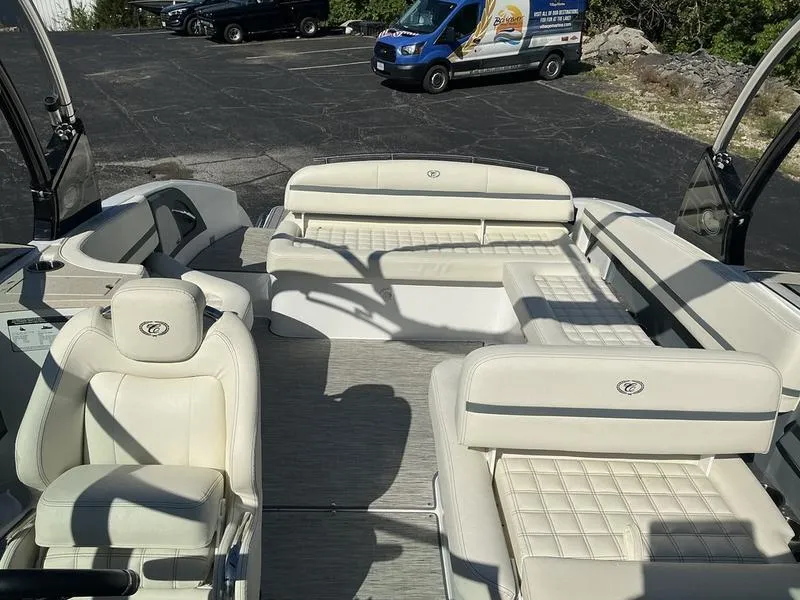 Slide: The Image of 2021 Cobalt R7 boat interior with luxurious white seating and spacious layout. - 4