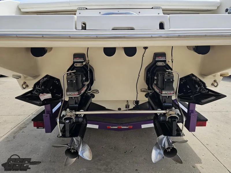 Slide: The Image of 1999 Powerquest 380 Avenger boat with dual propellers and Bravo One outdrives. - 27