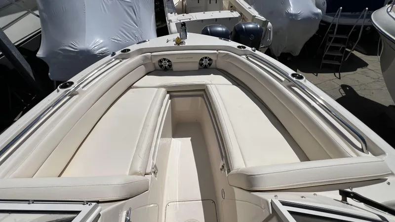 Slide: The Image of 2026 Grady-White GW 235 Freedom boat with spacious seating and sleek design. - 21