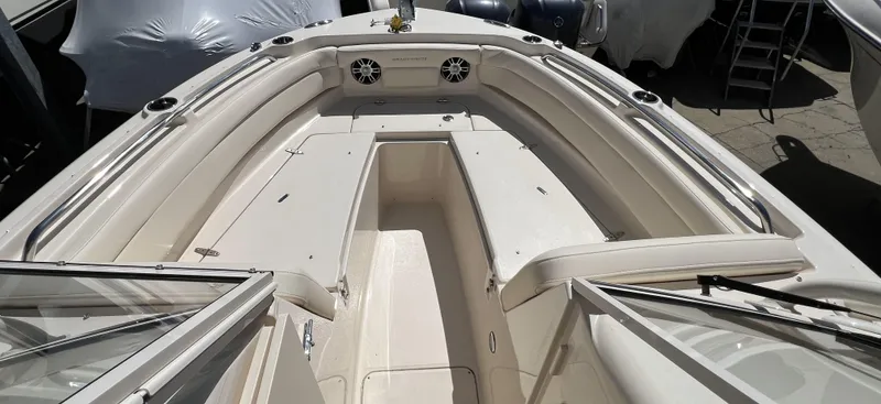 Slide: The Image of 2026 Grady-White GW 235 Freedom boat interior with spacious seating and modern design. - 22