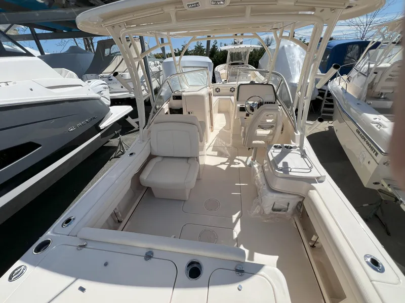 Slide: The Image of 2026 Grady-White GW 235 Freedom boat interior, featuring spacious seating and modern design. - 3