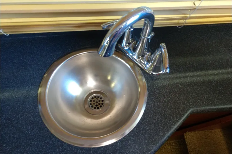 Slide: The Image of Stainless steel sink with chrome faucet on Tollycraft 43 Motoryacht, 1981 model. - 35