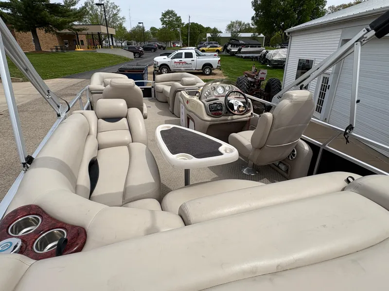 Slide: The Image of 2011 Sun Tracker PARTY BARGE 25 with spacious seating and modern dashboard. - 29