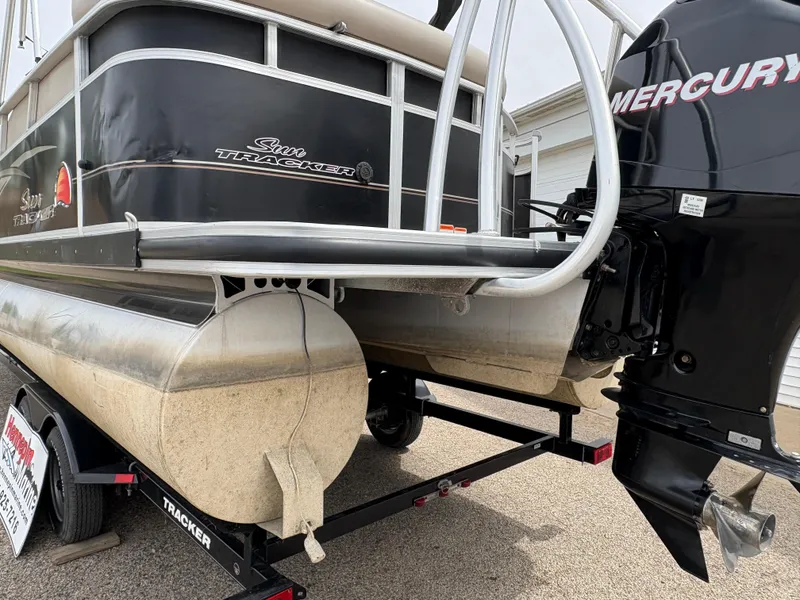 Slide: The Image of 2011 Sun Tracker PARTY BARGE 25 pontoon boat with Mercury outboard motor on trailer. - 34