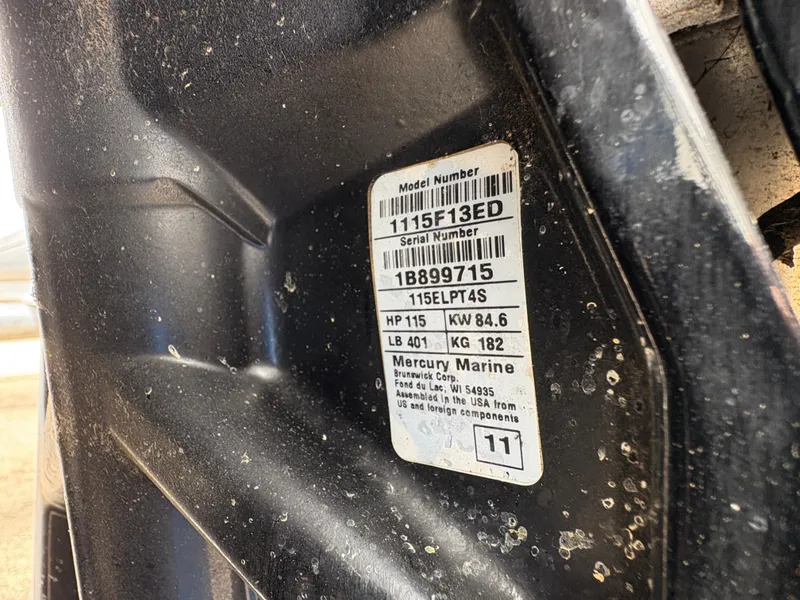 Slide: The Image of Label on a 2011 Sun Tracker PARTY BARGE 25, displaying model and serial numbers. - 35