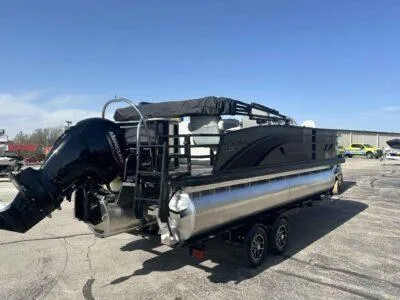 Slide: The Image of 2025 Lowe SF 214 pontoon boat with outboard motor on a trailer. - 7
