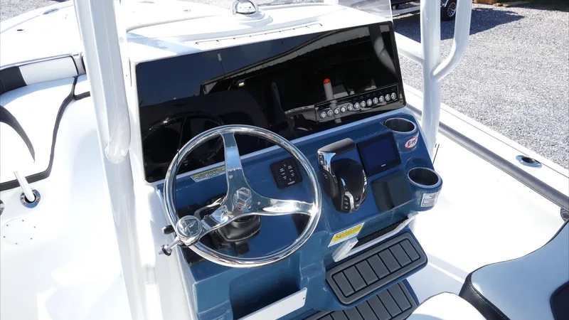 Slide: The Image of 2025 Tidewater 2300 Carolina Bay boat with trim tab and hydraulic actuator. - 16