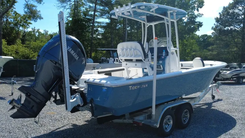 Slide: The Image of Overhead view of 2025 Tidewater 2300 Carolina Bay boat on gravel surface. - 2