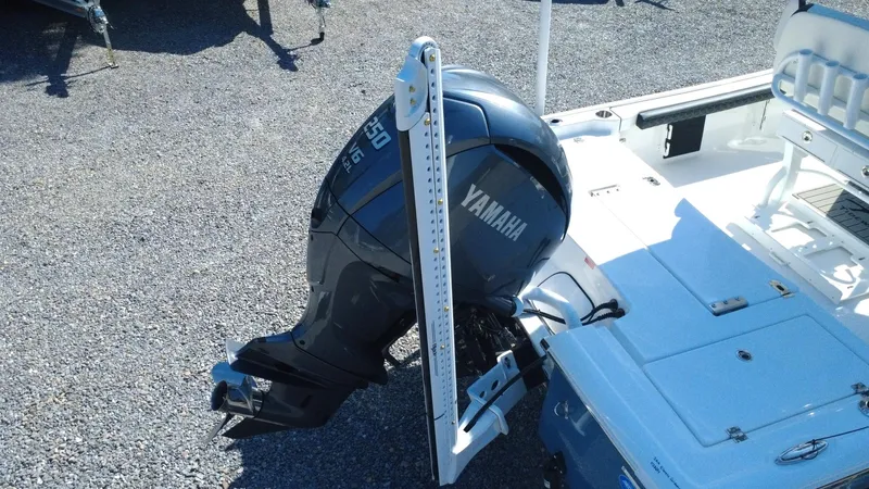 Slide: The Image of 2025 Tidewater 2300 Carolina Bay boat interior with seating and storage compartments. - 8