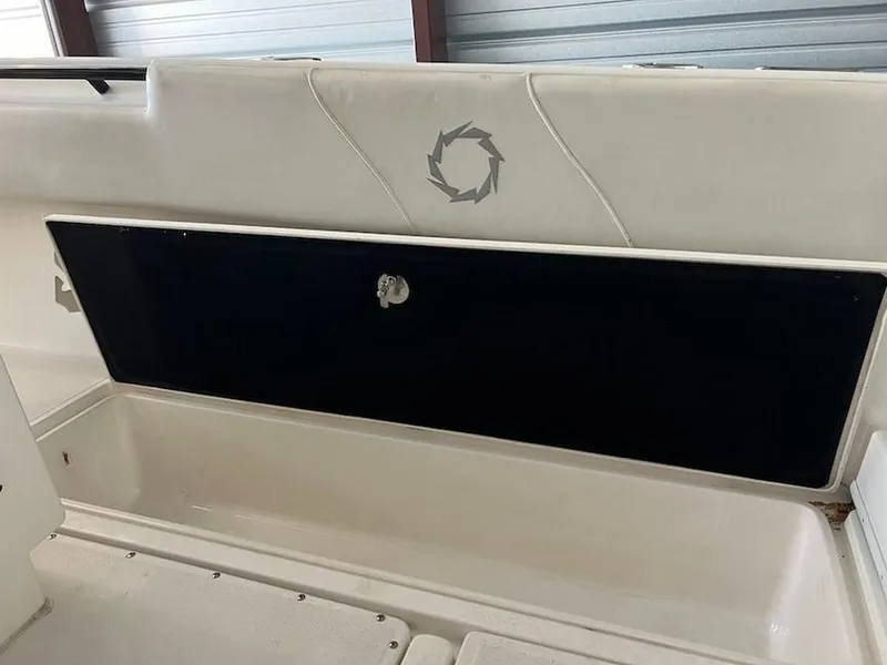 Slide: The Image of 2006 Fountain 23 Tournament CC boat interior with storage compartment. - 12