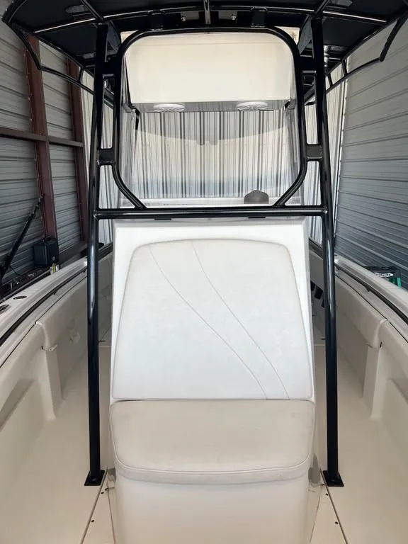 Slide: The Image of 2006 Fountain 23 Tournament CC boat interior with white seating and black frame. - 7