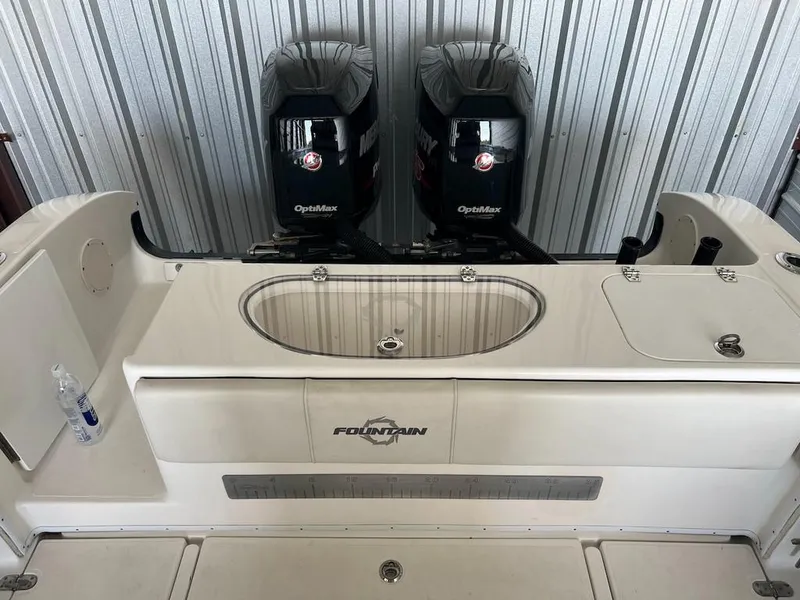 Slide: The Image of 2006 Fountain 23 Tournament CC boat with dual outboard motors in storage. - 9