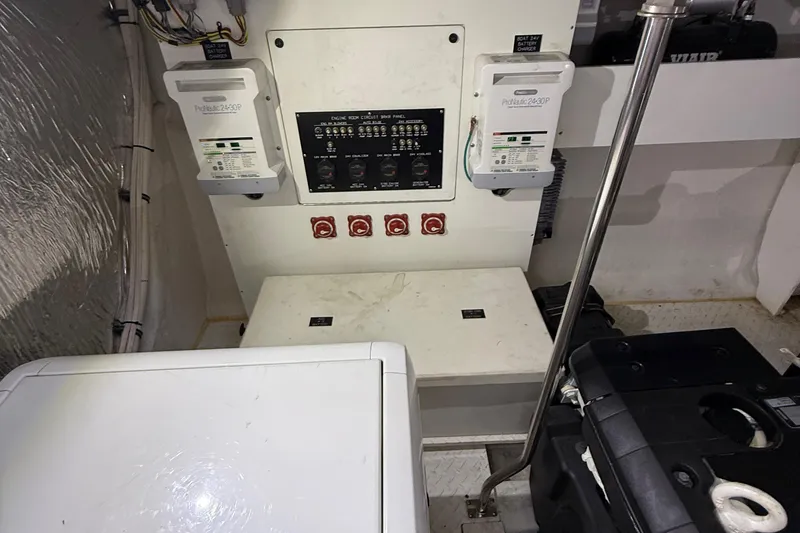 Slide: The Image of Electrical panel and equipment in 2014 Cruisers Yachts 54 Sport Coupe engine room. - 34