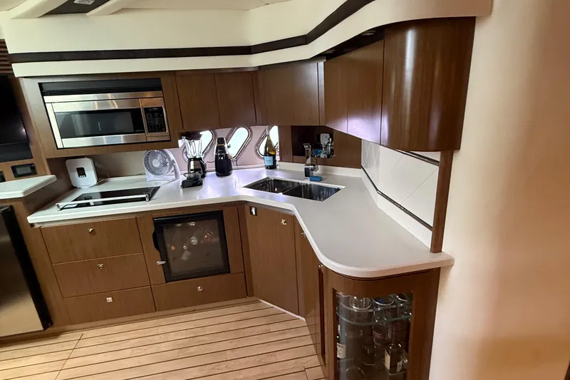 Slide: The Image of Luxurious kitchen interior of 2014 Cruisers Yachts 54 Sport Coupe with modern appliances. - 53