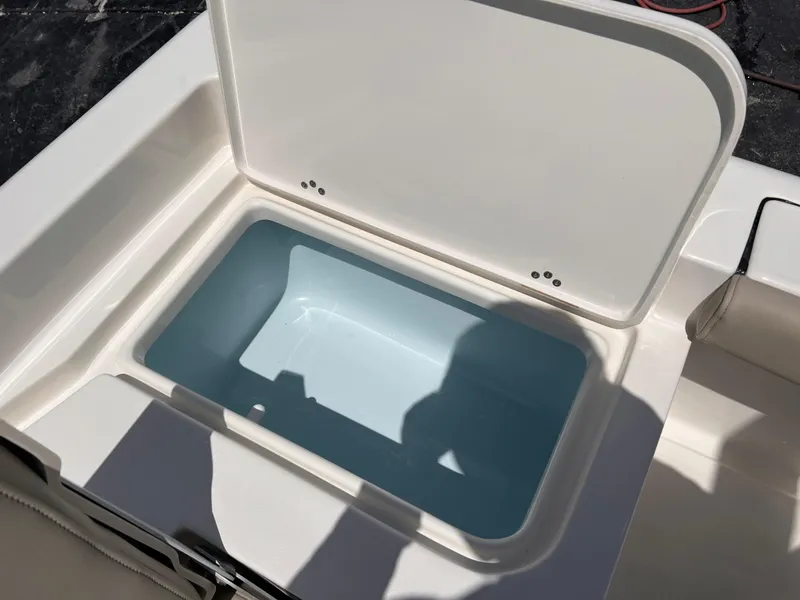 Slide: The Image of Open storage compartment on 2025 Key West 179 FS boat, showcasing interior space. - 10