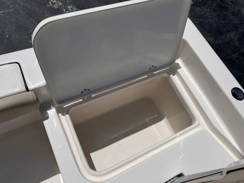 Slide: The Image of Open storage compartment on 2025 Key West 179 FS boat, showcasing interior space. - 11