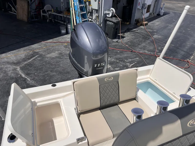Slide: The Image of 2025 Key West 179 FS boat with Yamaha 115 engine, featuring seating and storage compartments. - 9