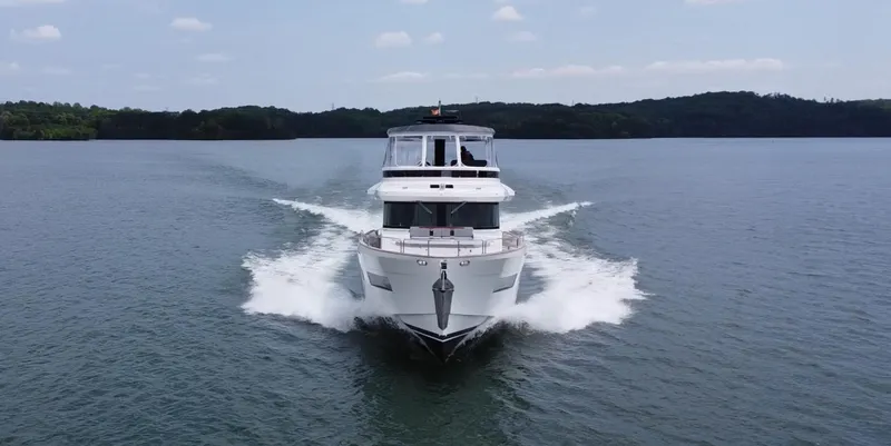 Slide: The Image of Sirena 58 yacht cruising on a calm lake, 2021 model. - 11