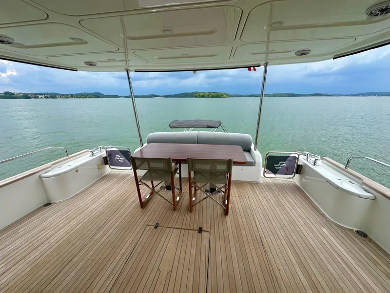 Slide: The Image of Spacious deck of 2021 Sirena 58 yacht with scenic water view. - 38