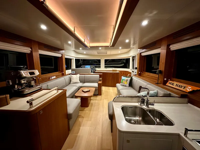 Slide: The Image of Luxurious interior of 2021 Sirena 58 yacht with modern furnishings and ambient lighting. - 47