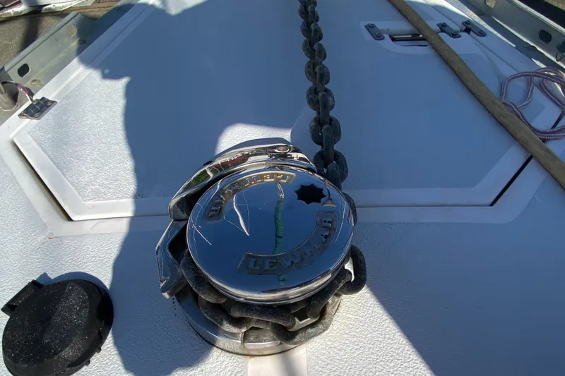 Slide: The Image of Anchor windlass on 1989 Hunter Legend 40 sailboat deck. - 38