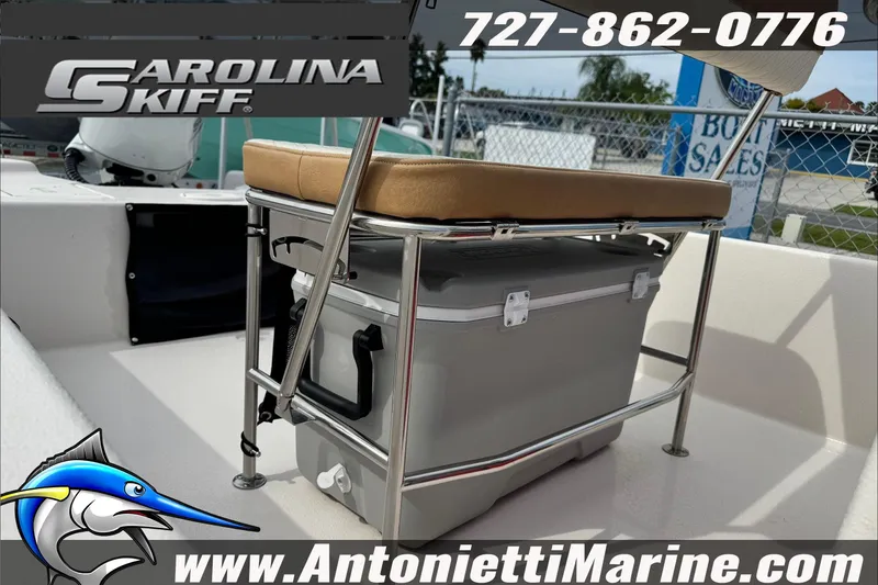 Slide: The Image of 2025 Carolina Skiff E20 JVX boat interior with cooler and seating. - 10