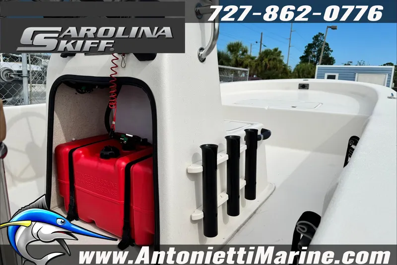 Slide: The Image of 2025 Carolina Skiff E20 JVX boat interior with storage and rod holders, Antonietti Marine branding. - 7
