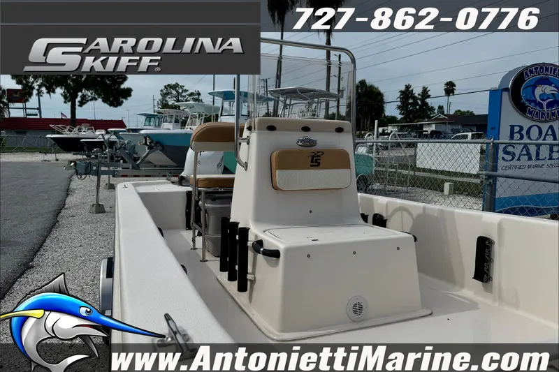 Slide: The Image of 2025 Carolina Skiff E20 JVX boat displayed at Antonietti Marine sales. - 9