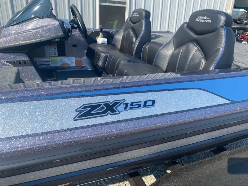 Slide: The Image of 2025 Skeeter ZX150 boat with sleek design and comfortable seating. - 2