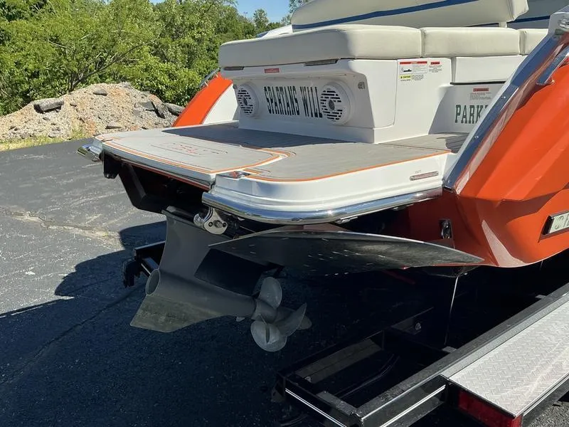 Slide: The Image of 2021 Cobalt R7 Surf boat rear view with swim platform and propeller. - 8