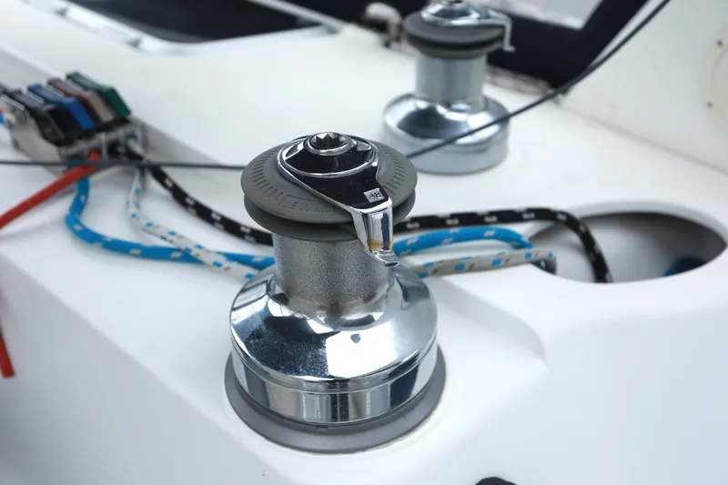 Slide: The Image of Winch system on 1995 Hunter 430 sailboat deck with ropes and controls. - 10