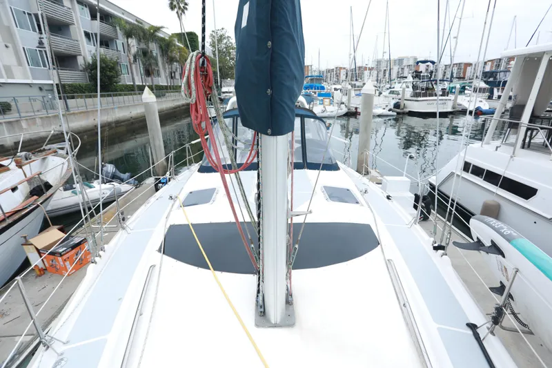Slide: The Image of Hunter 430 sailboat deck view, docked in marina, 1995 model. - 3