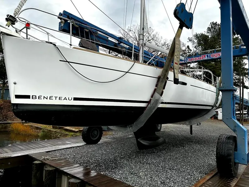 Slide: The Image of Beneteau Oceanis 37 Platinum sailboat, 2015 model, on a lift for maintenance. - 32