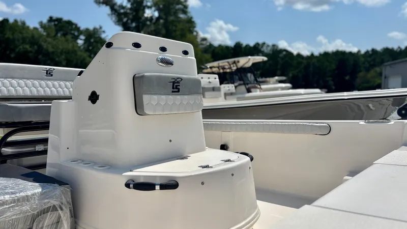 Slide: The Image of 2025 Carolina Skiff 19 LS Stealth Edition boat interior with console and seating. - 4