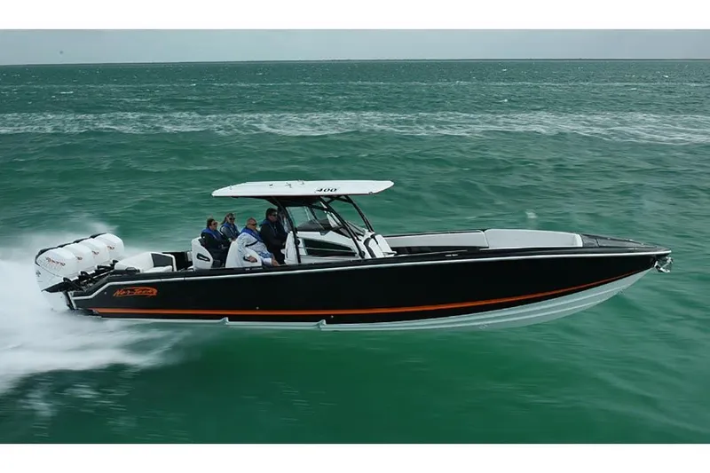 Slide: The Image of 2026 Nor-Tech 390 Sport Center Console with powerful Racing 400 outboard engines. - 10